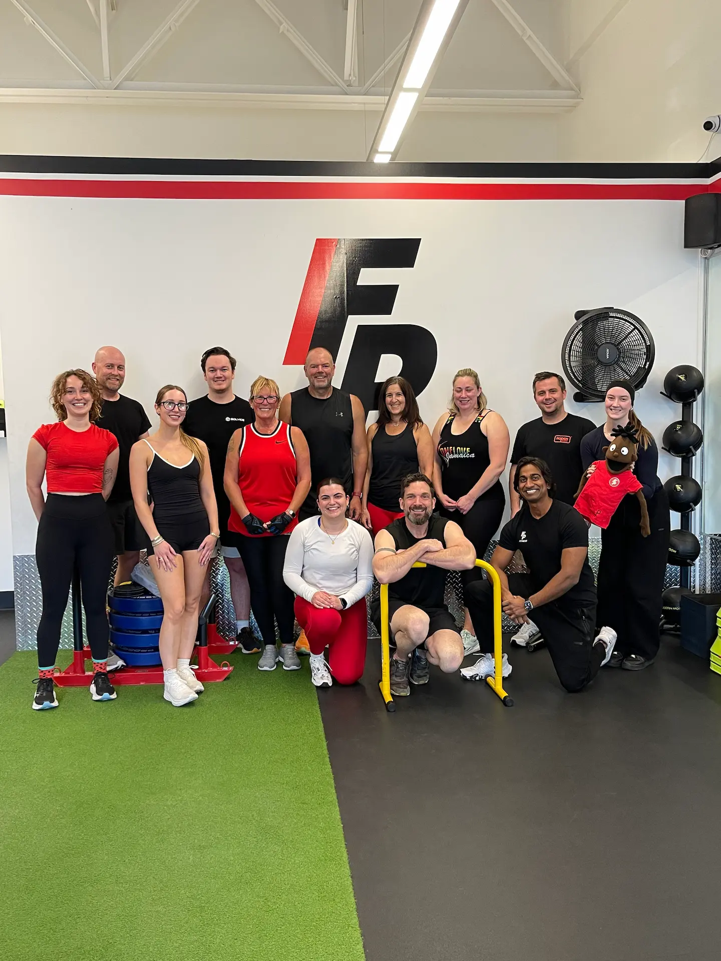 FP Fitness members and coaches together at the Burlington gym